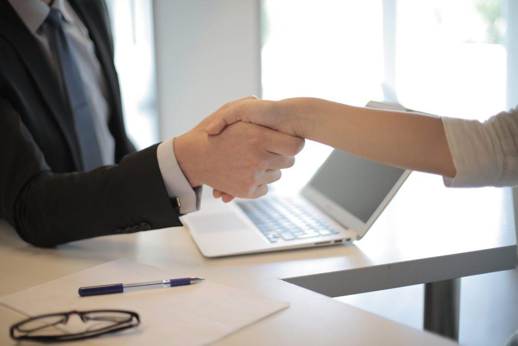 The Benefits of Doing Business with a Local VoIP Provider 1 Local VoIP provider handshake.
