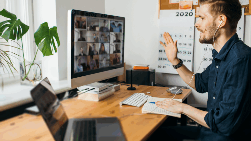 Green Technology: VoIP and the Environment 2 man on video conference: remote working and green technology.