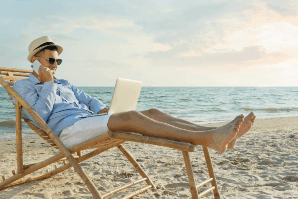 VoIP for remote teams: Remote worker on laptop using VoIP system in Cape Cod