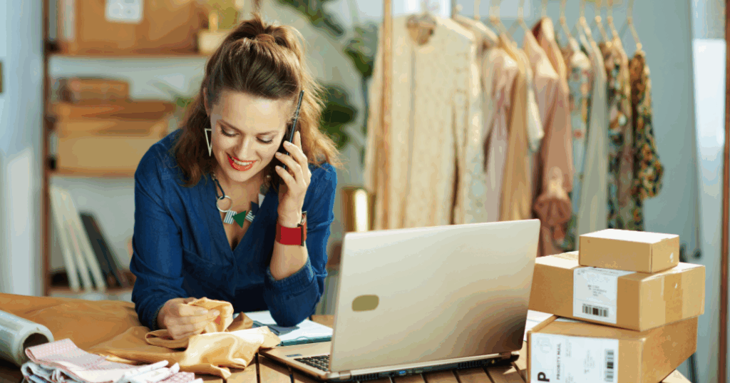 Small business owner using cell phone to communicate
