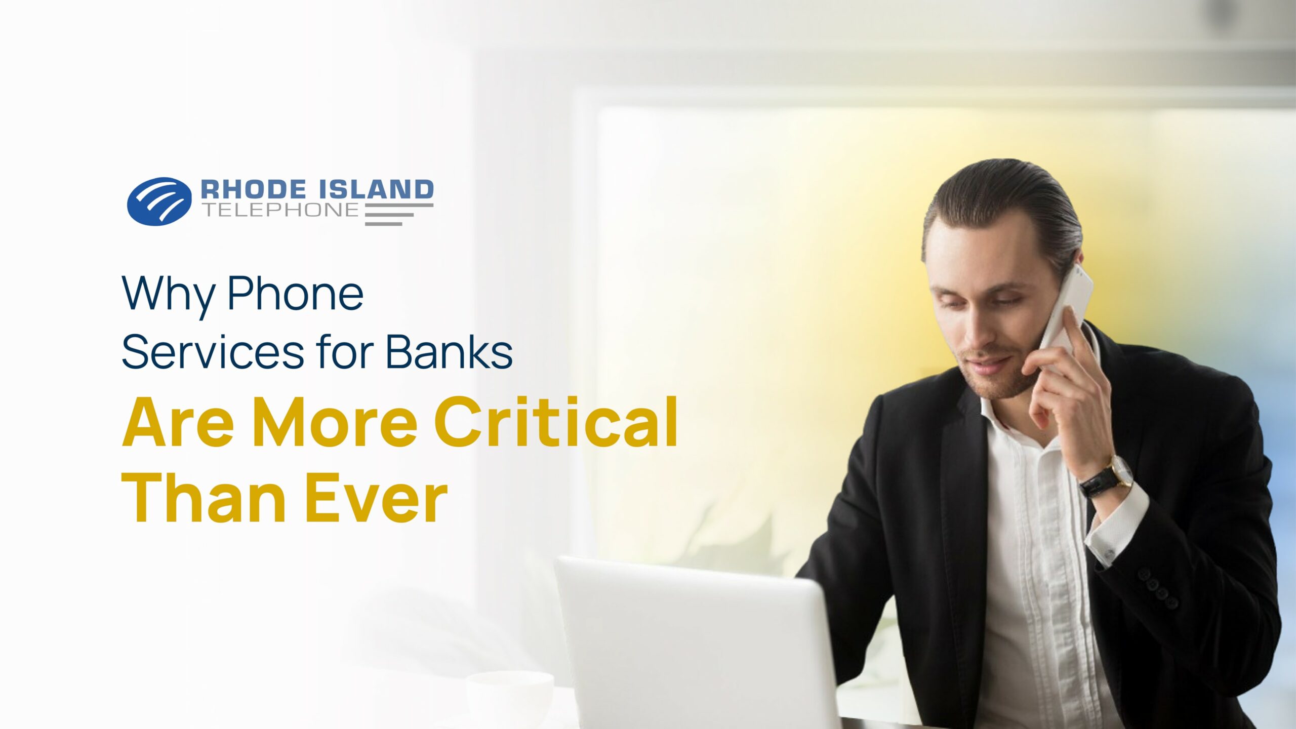 Business professional on a phone call while working at a laptop, highlighting phone services for banks.