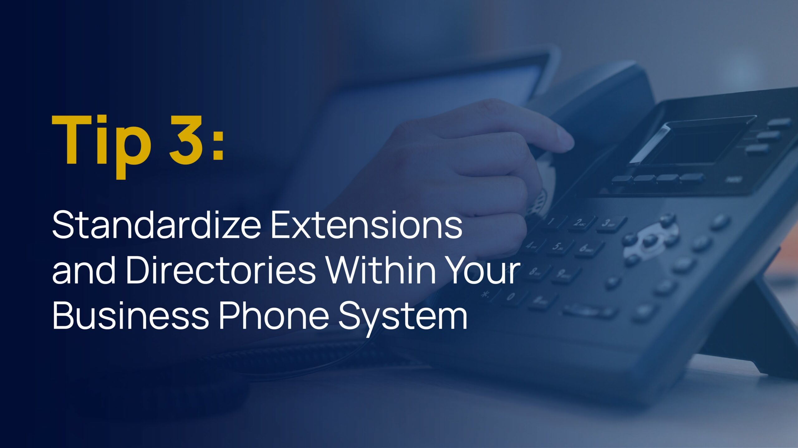 Hand picking up a desk phone receiver with text that reads, “Tip 3: Standardize Extensions and Directories Within Your Business Phone System.”